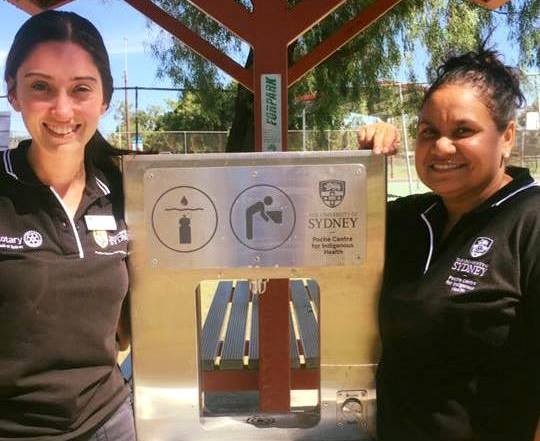 Photo of two women with the water fountain at Boggabilla.