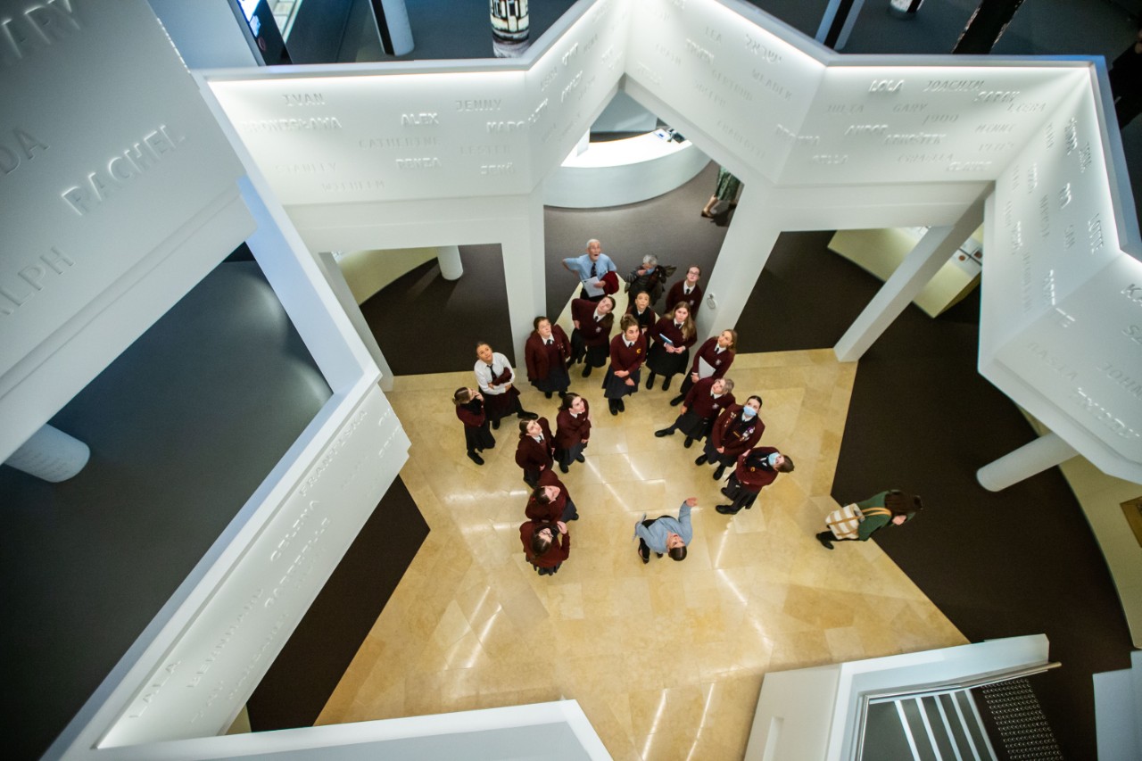 Students look up at the ceiling in the Sydney Jewish Museum