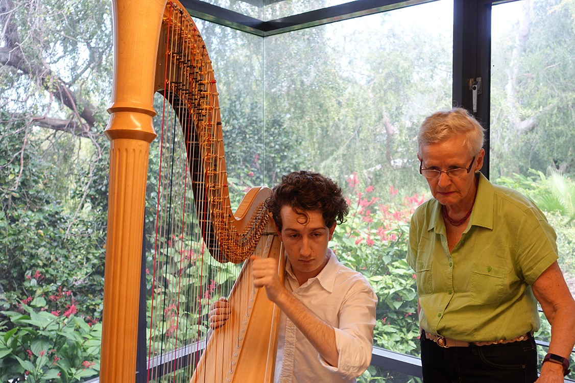 Will Nichols harpist runs through his solo part with Anne Boyd