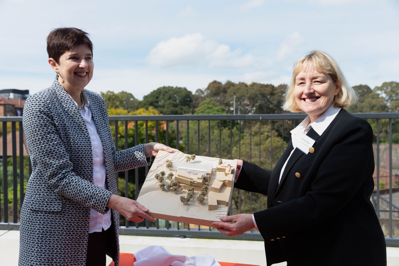 Professor Robyn Ward and Dr Teresa Anderson with SBA model