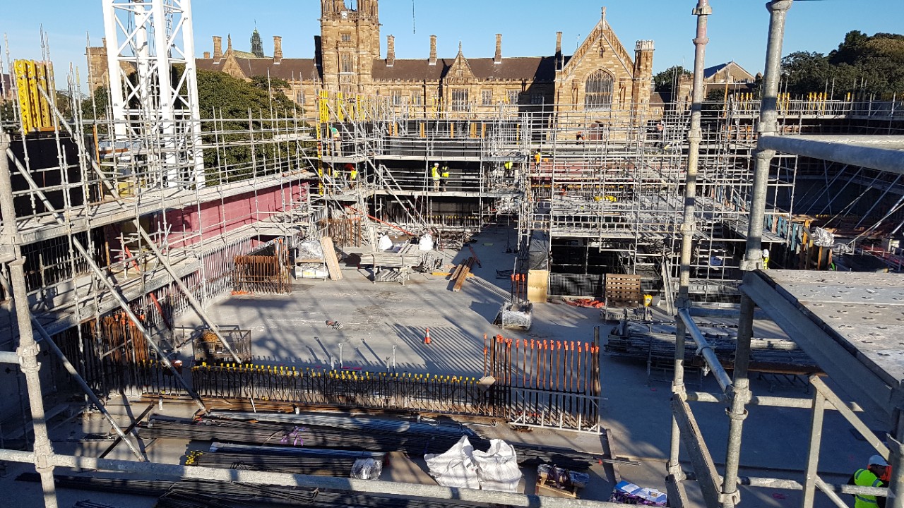 The Chau Chak Wing Museum under construction in July 2019. The University's quadrangle features in the background.