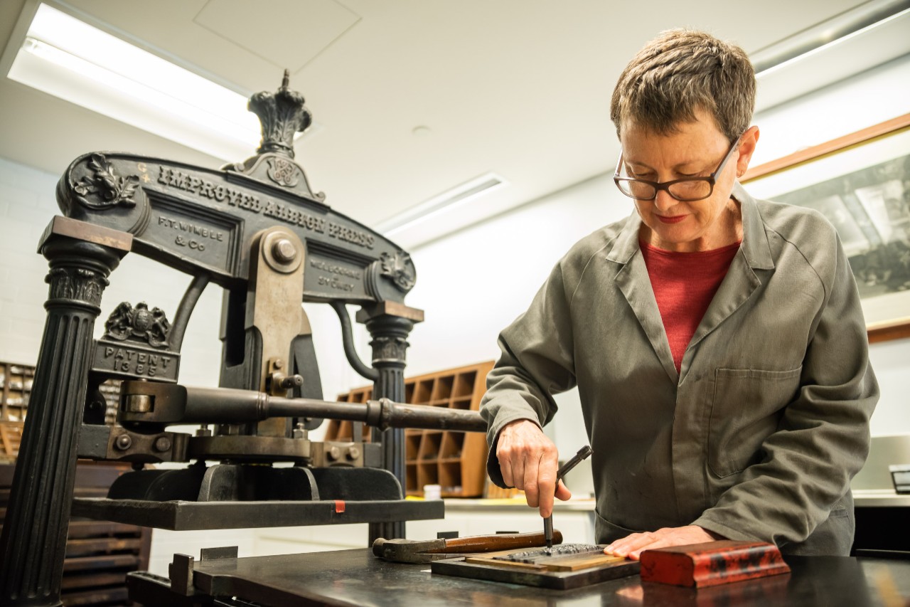 Barbara Campbell, 2019 Printer in Residence, in the University of Sydney Fisher Library’s printing workshop.