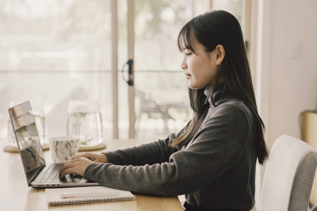 Woman working from home at a desk