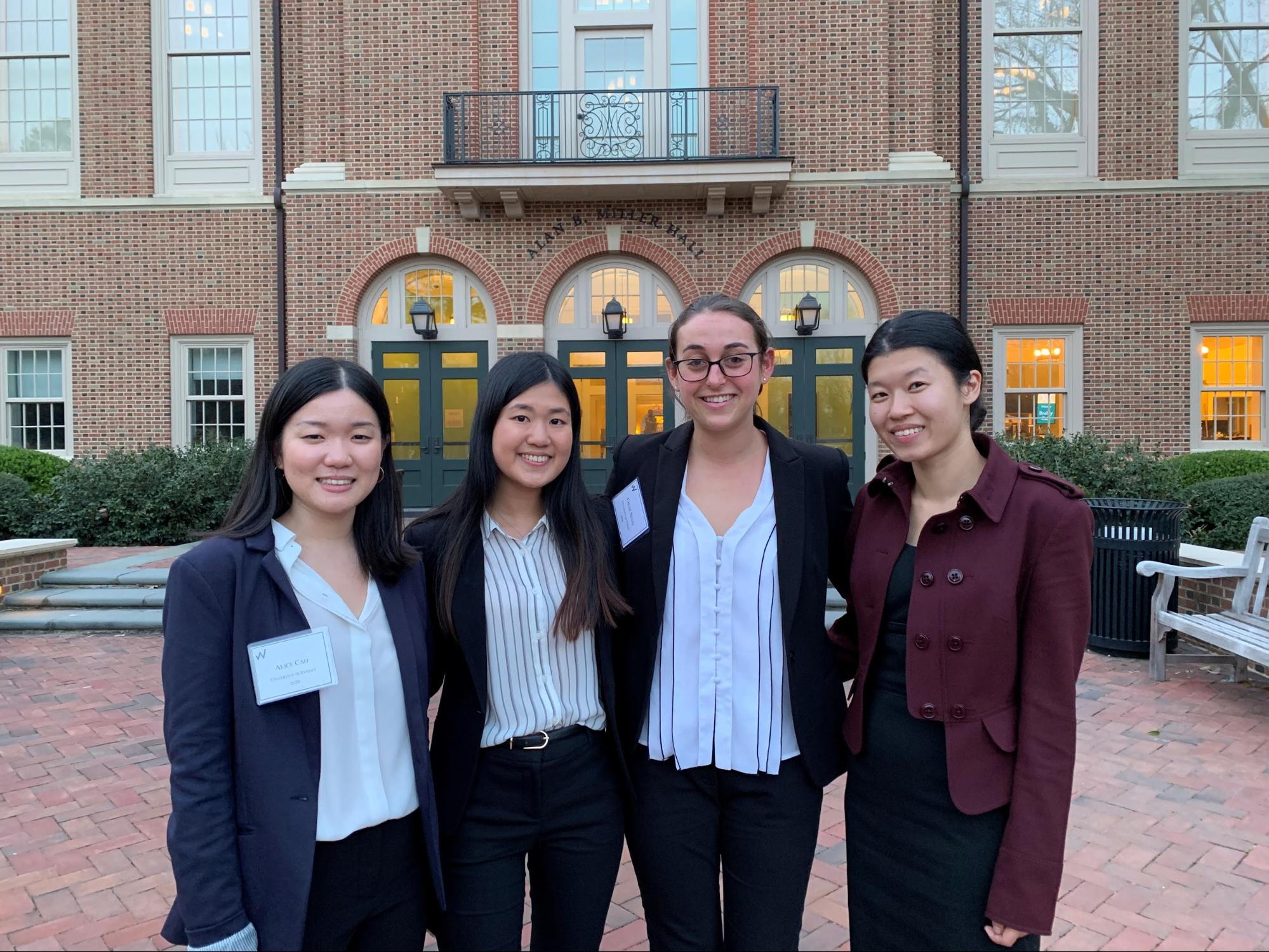 Chloe and three female students outside a college in the USA