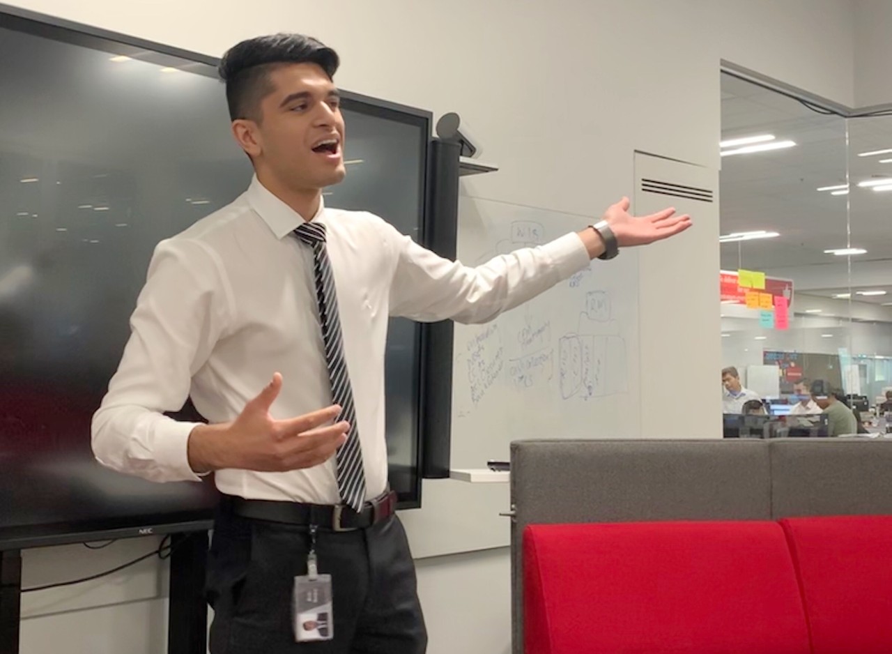 Ricky Rangra presenting in the AMP offices