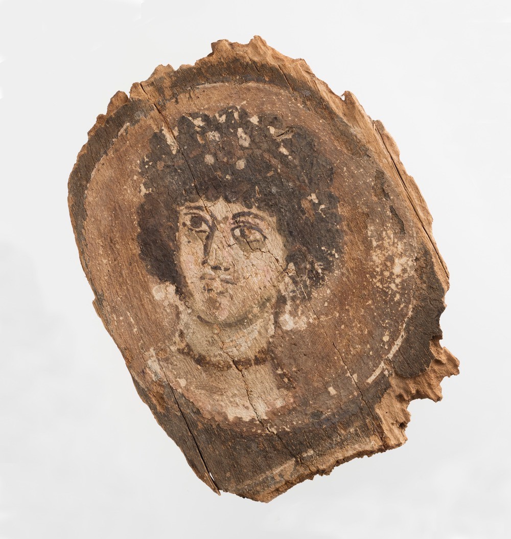 Portrait of a young woman painted on a wooden panel