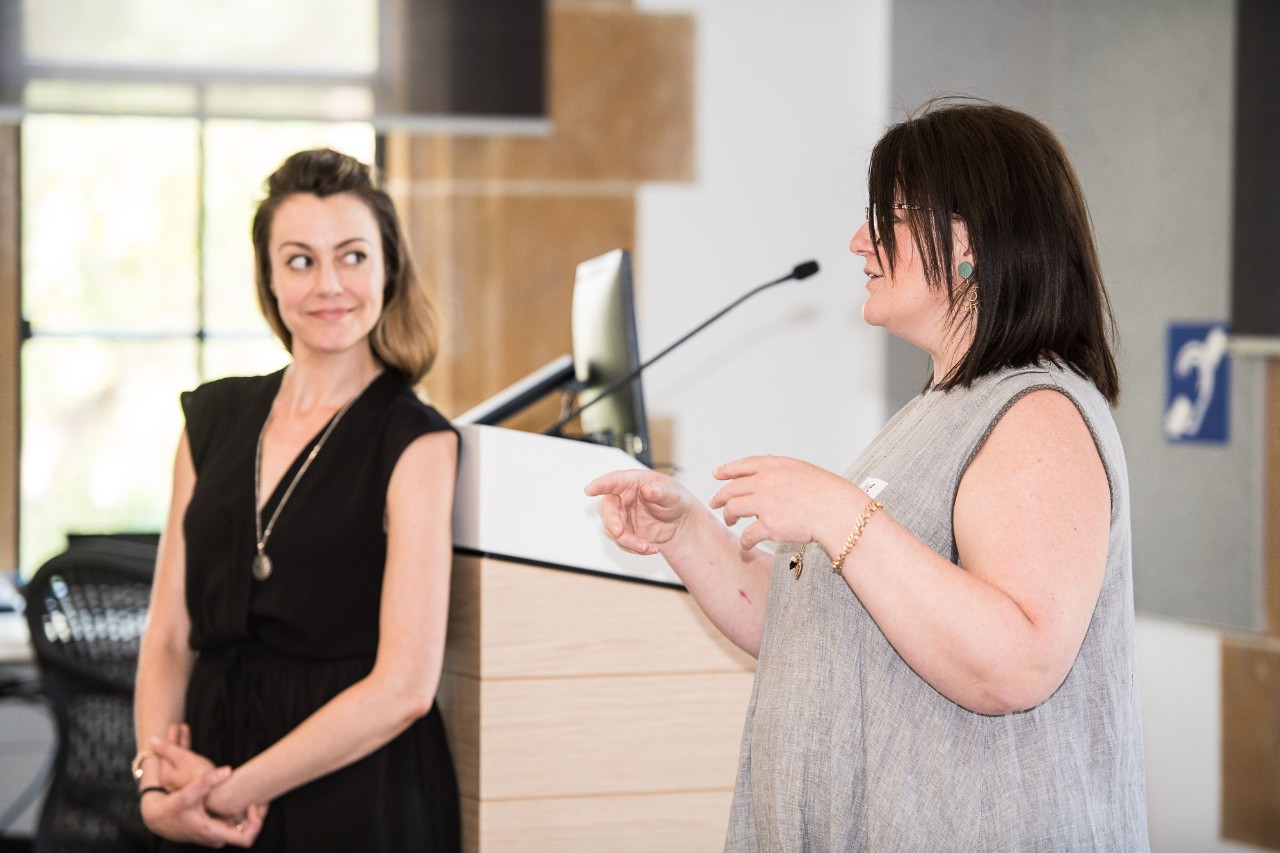Margot Politis (left), Artistic Director of Milk Crate Theatre and Jodie Wainwright, CEO of Milk Crate Theatre speaking at the SSSHARC Huddle