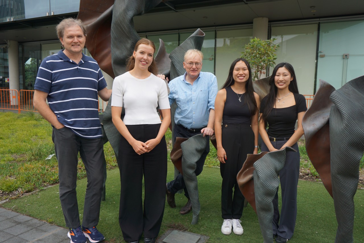 Pictured Professor Roger Magnusson, the Dean of the Law School Simon Bronitt, Sophia Bleakley, Helen Zhang and Clare Gim.