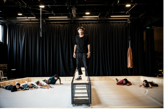 JK Kazzi rehearsing on stage as King Henry.