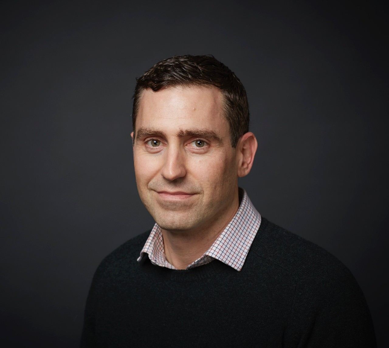 Headshot of Professor Alex Broom