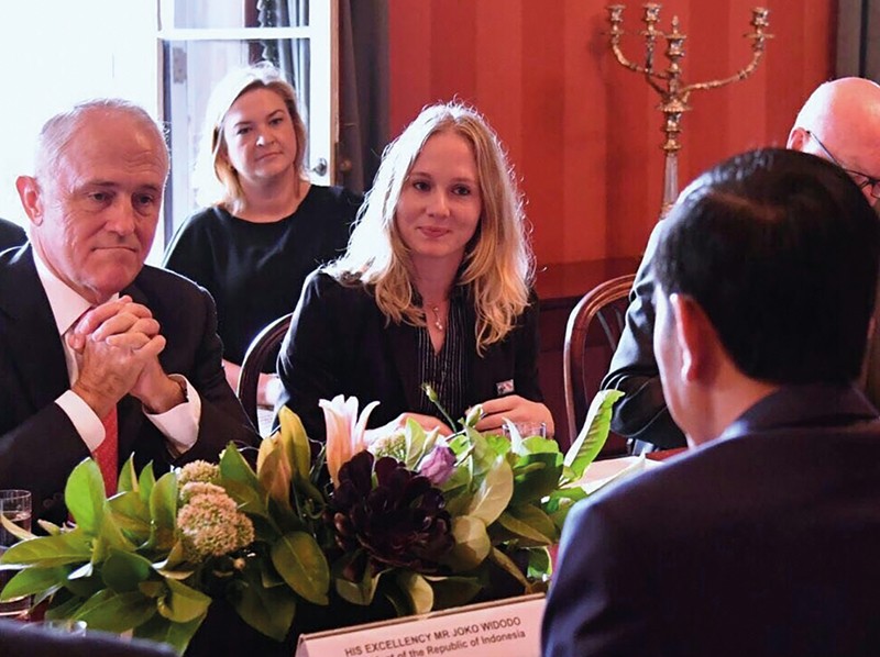 Amelia Lemondhi interprets between former Australian Prime Minister Malcolm Turnbull and Indonesian President Joko Widodo