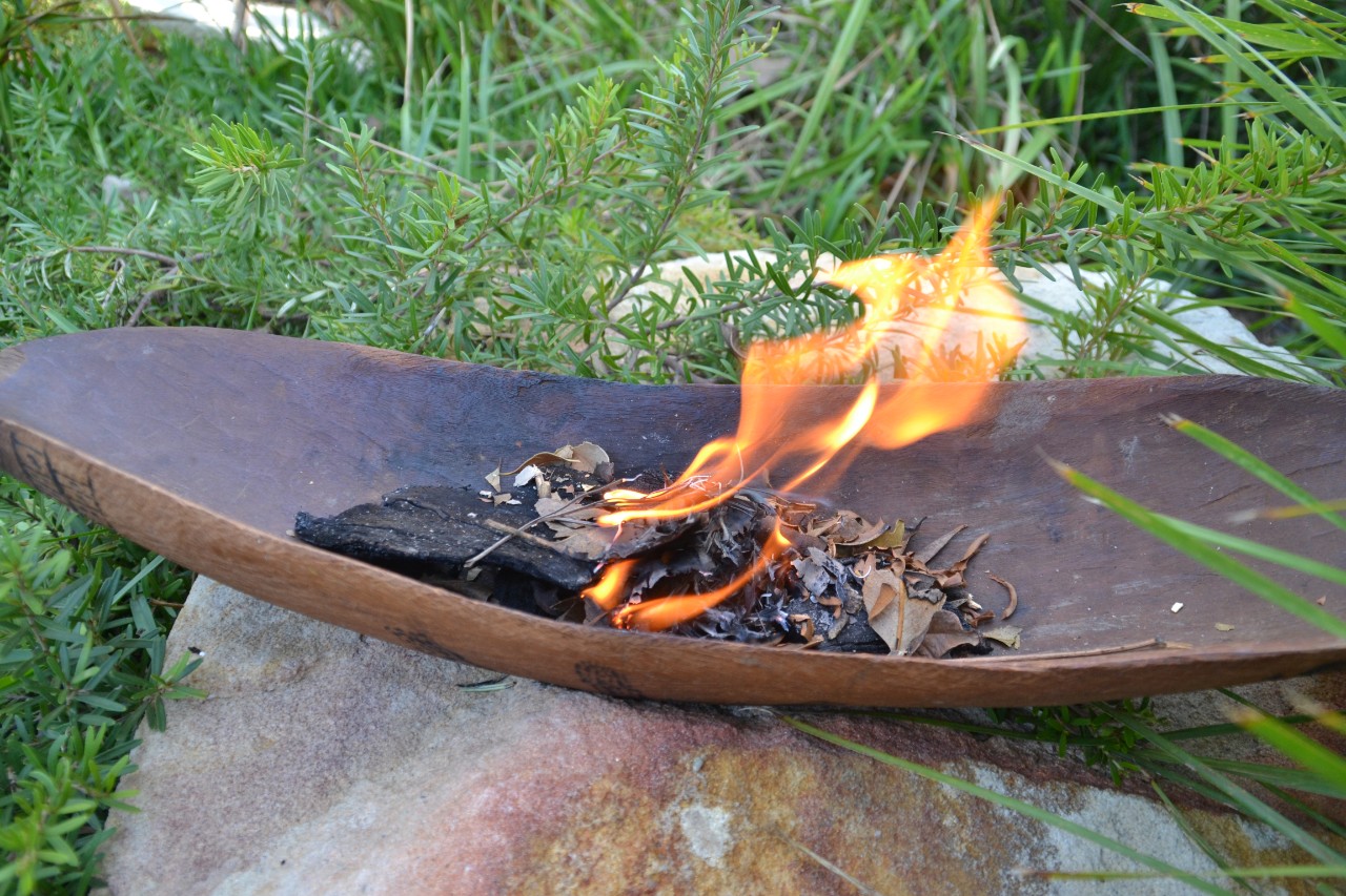 Leaves burning on a rock