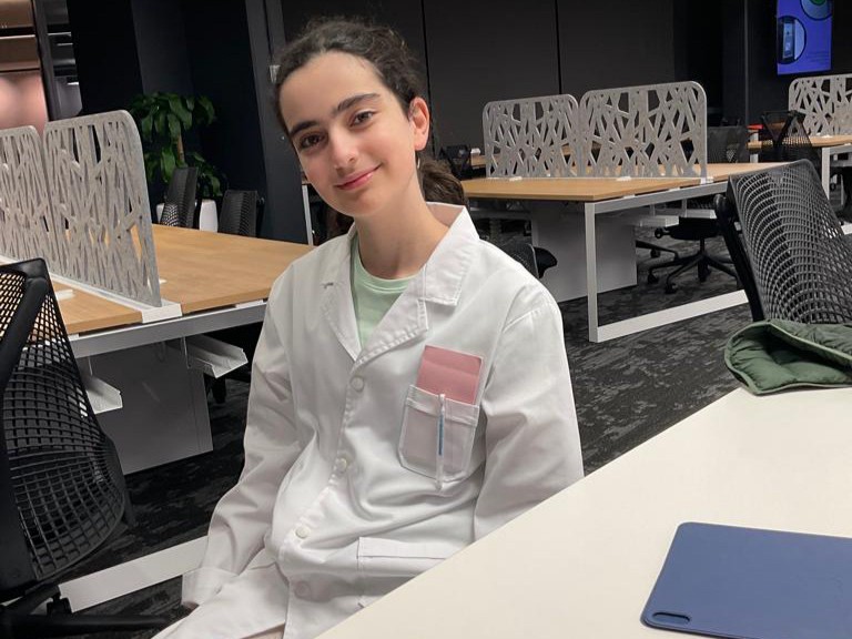 Zara smiling at the camera