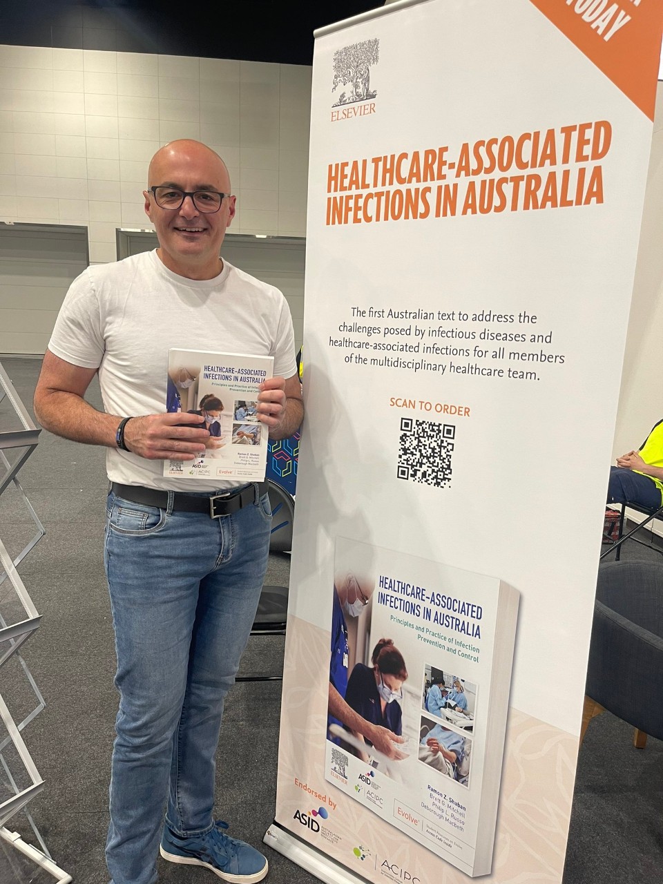 Ramon Shaban holding textbook