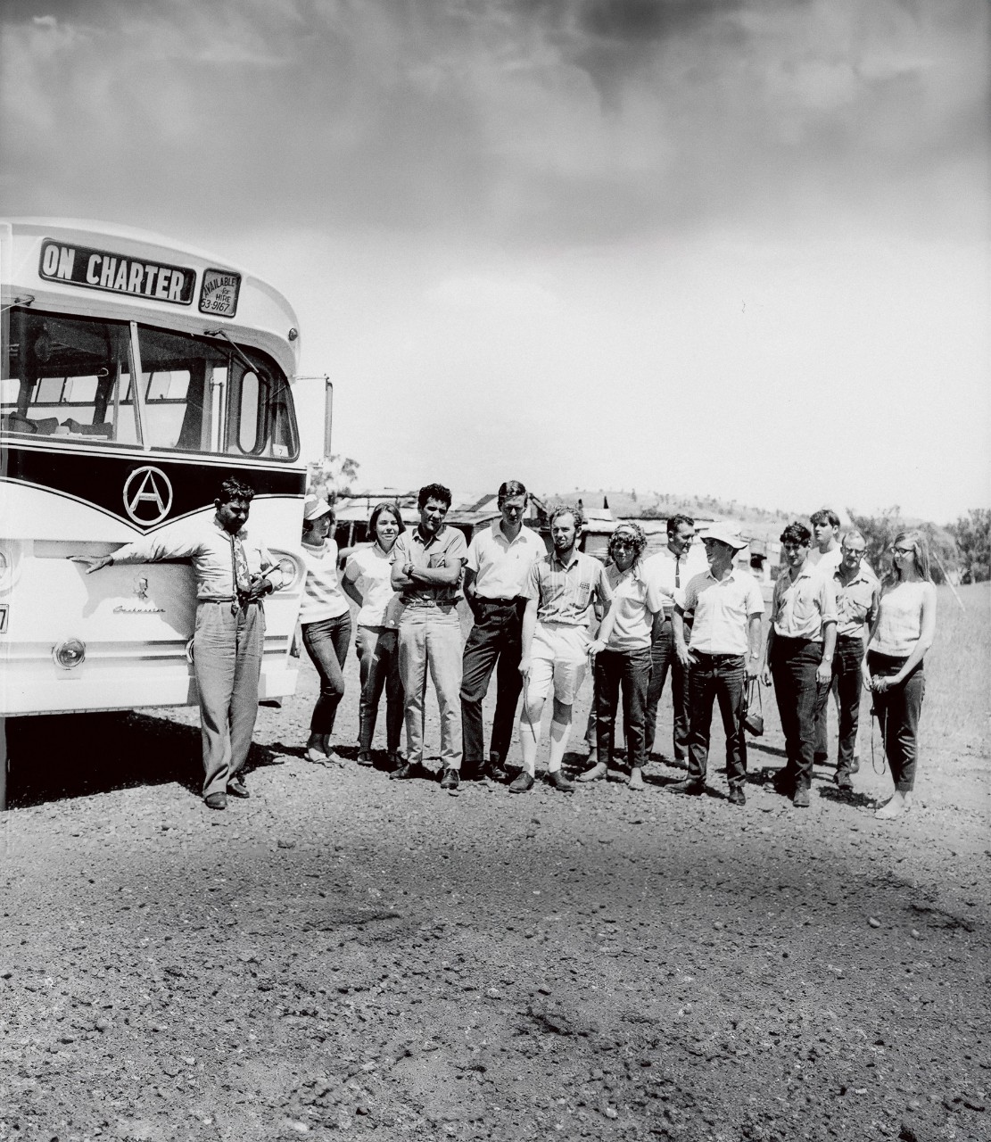 University of Sydney students during their 1965 Freedom Ride photographed in front of their bus