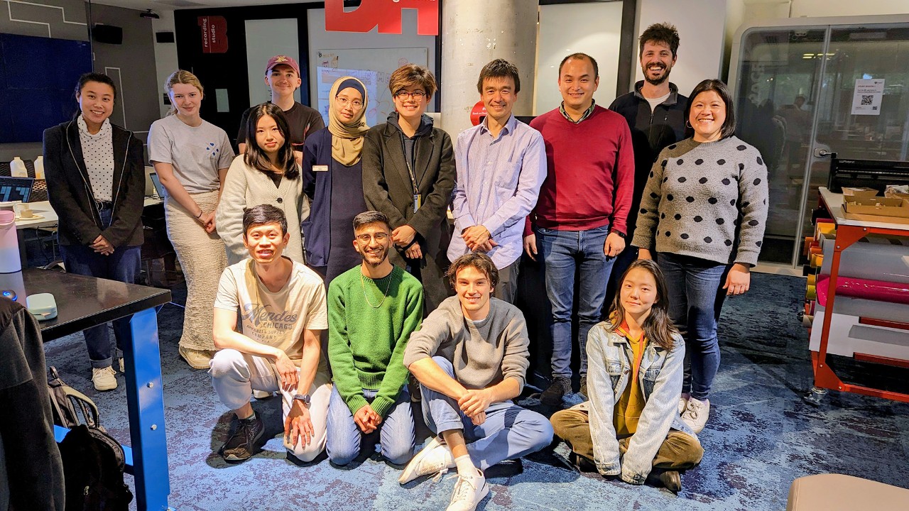 Photo of the team behind AI in Education, a group of 14 men and women