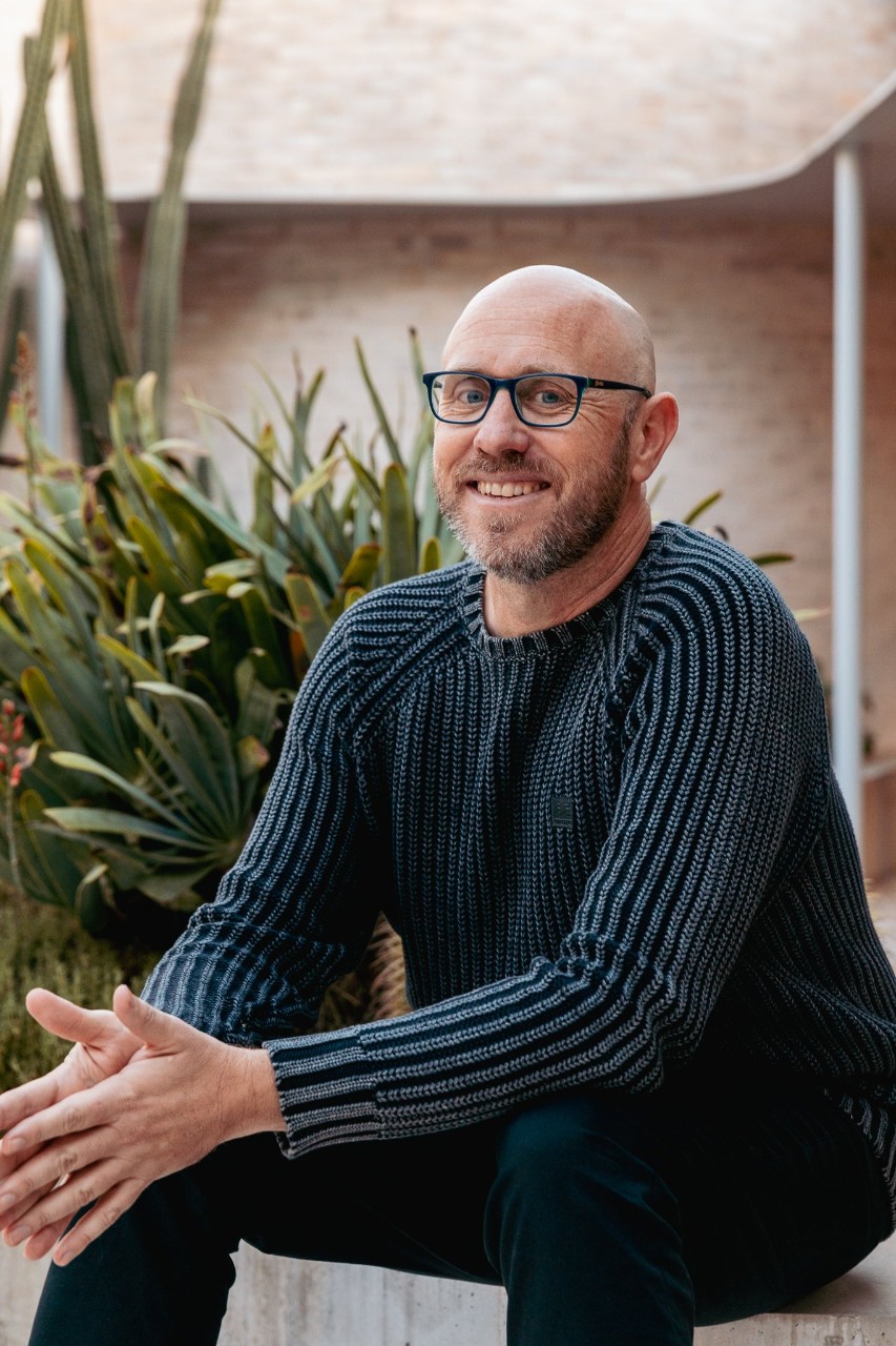 Photo of Damien Ricketson smiling 