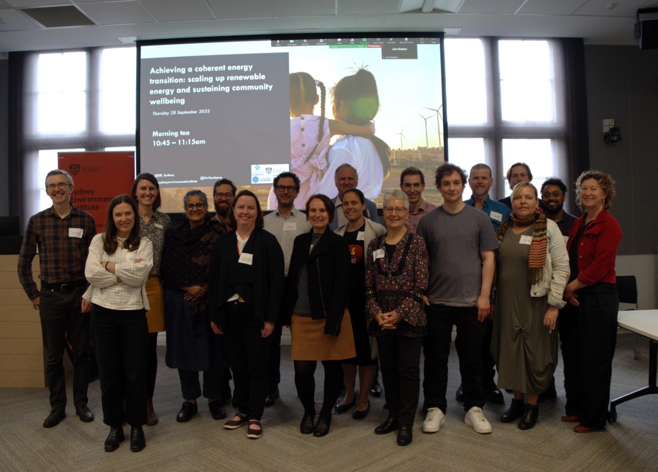 Group picture of researchers in seminar room