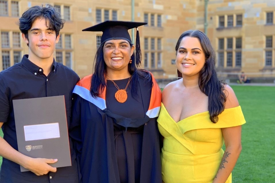 Kelli Owen with her family at graduation