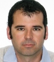 Professional headshot of Associate Professor Tom Bishop