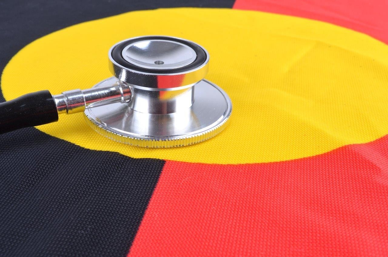 Abooriginal flag and a stethescope