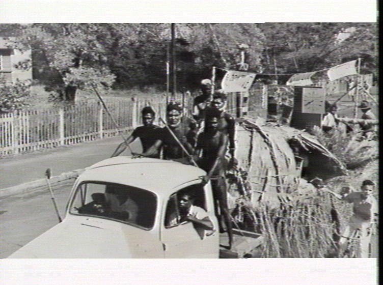 Aboriginal dancers on the road to the Botanical Gardens for a corroboree