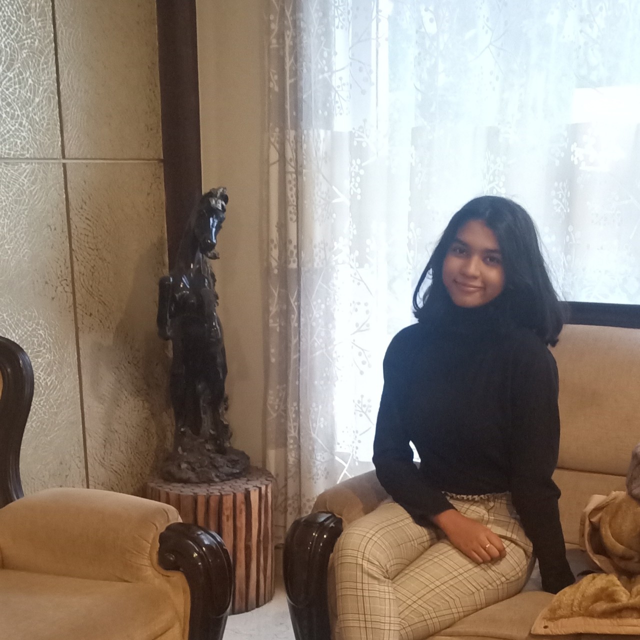 Young woman sitting on a couch