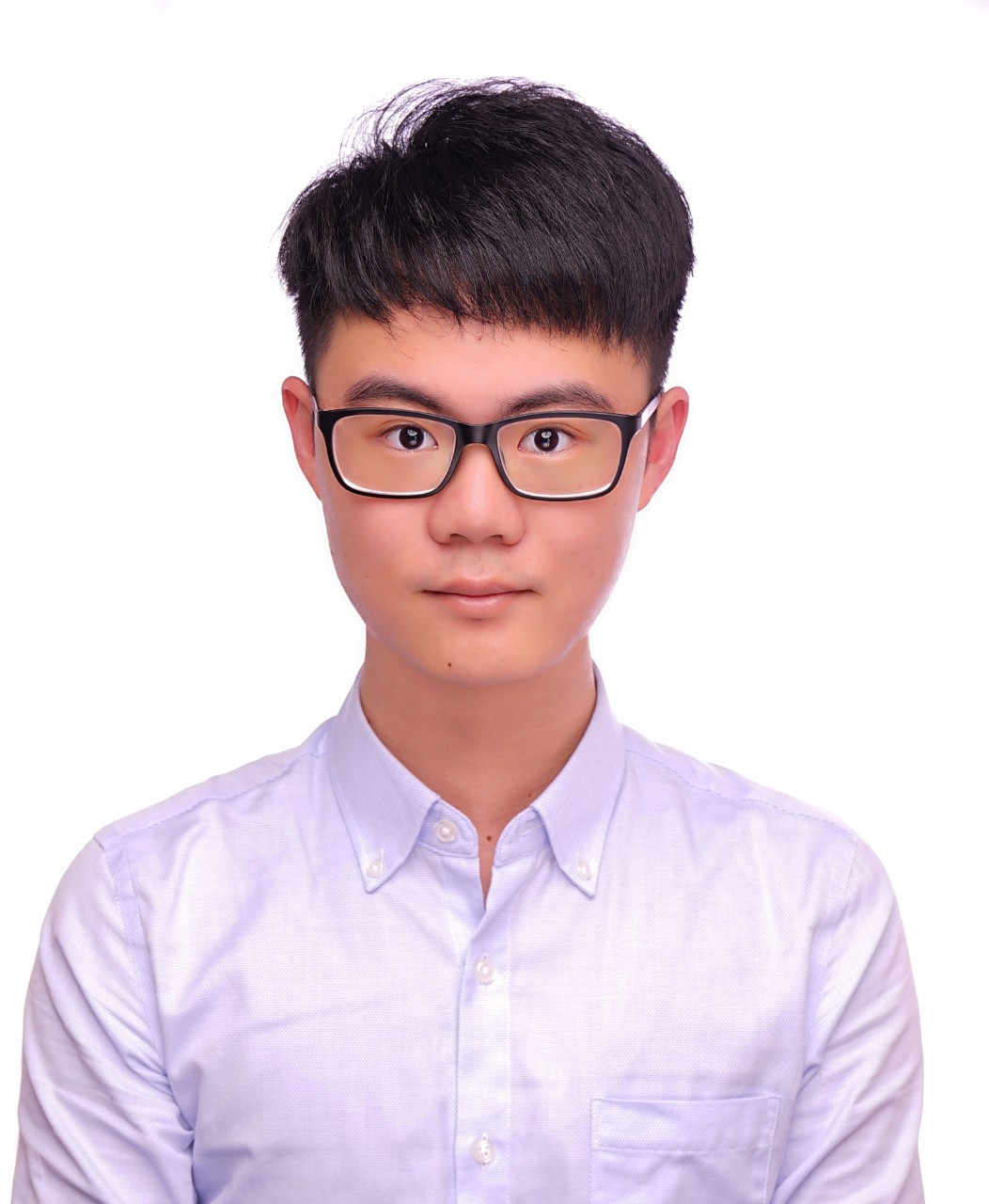 Man wearing light purple shirt and glasses