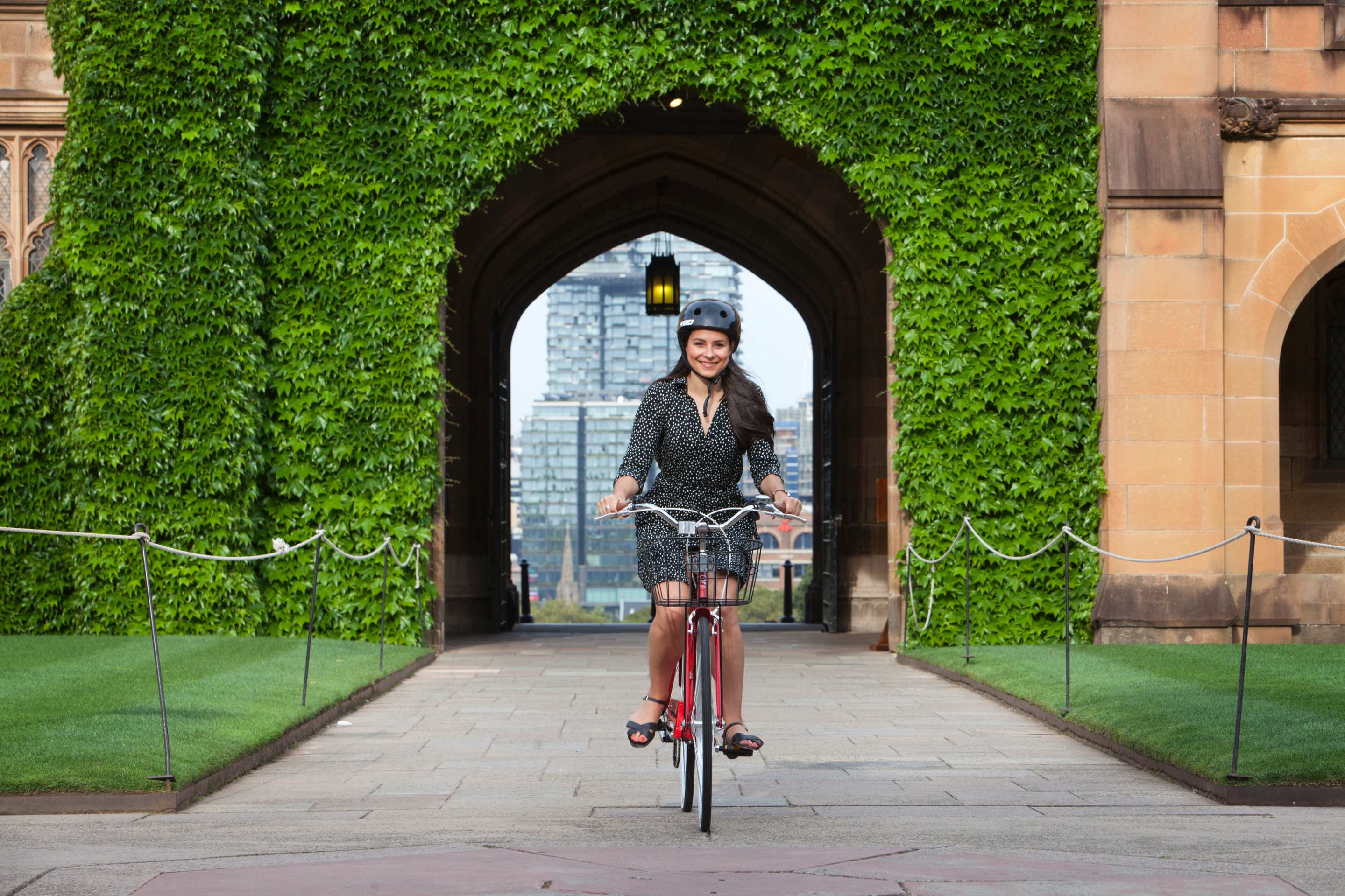 student on bike in archway