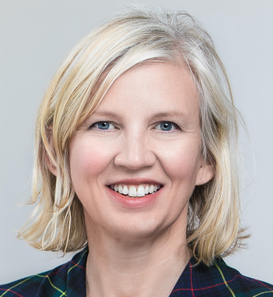 photo of a woman smiling at the camera