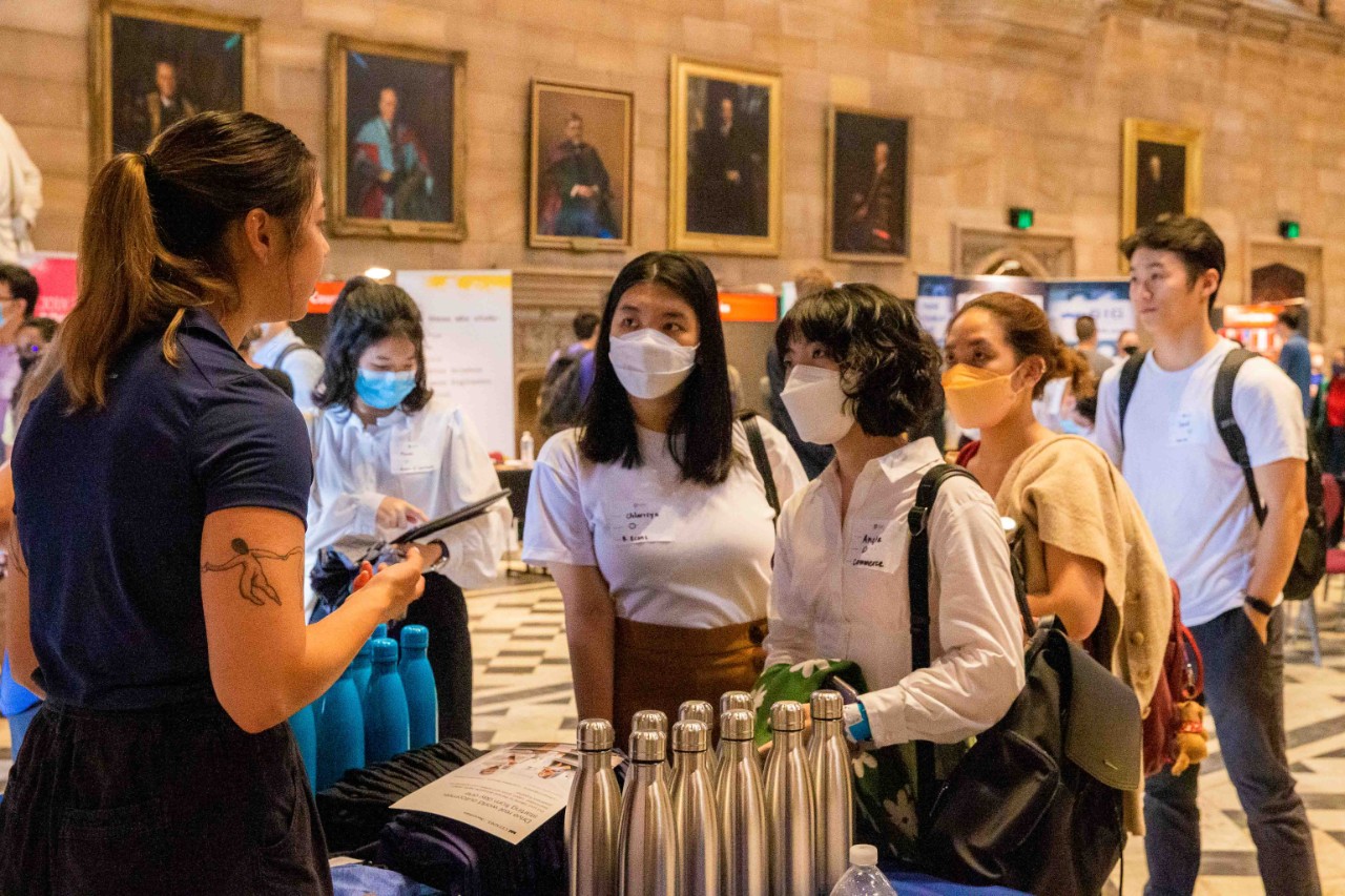 Students speaking with an employer at the 2022 Careers Fair 