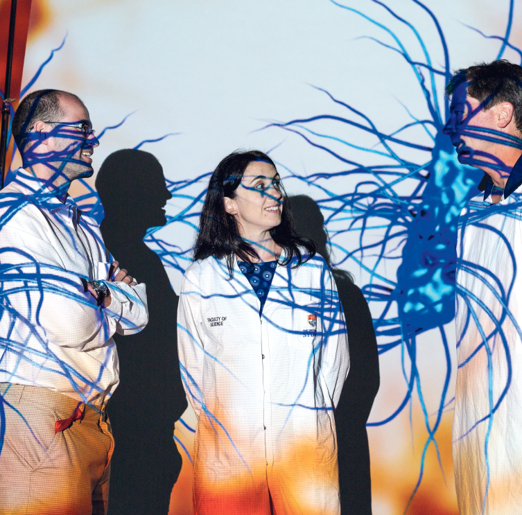 Projections of microbes from the microbiome. The cross-disciplinary team working to understand the human gut.