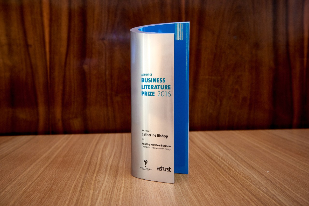 Dr Bishop walking up to podium