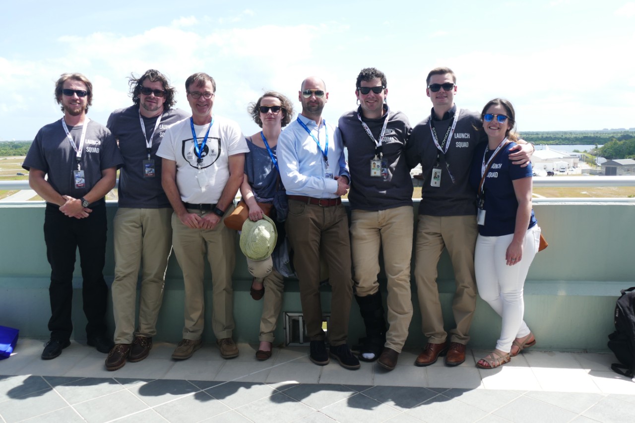 INSPIRE-2 lead Prof Iver Cairns (3rd from left) next to global QB50 Space Segment Engineer and CubeSat Coordinator Amandine Denis and QB50 Project Manager Davide Masutti (L-R) in front of the launch site at Cape Canaveral, after witnessing the lift-off to the International Space Station (ISS) last month